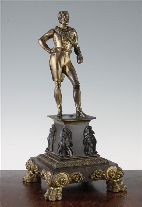 A late 19th century French patinated bronze and ormolu figure of a French military officer, 14in.